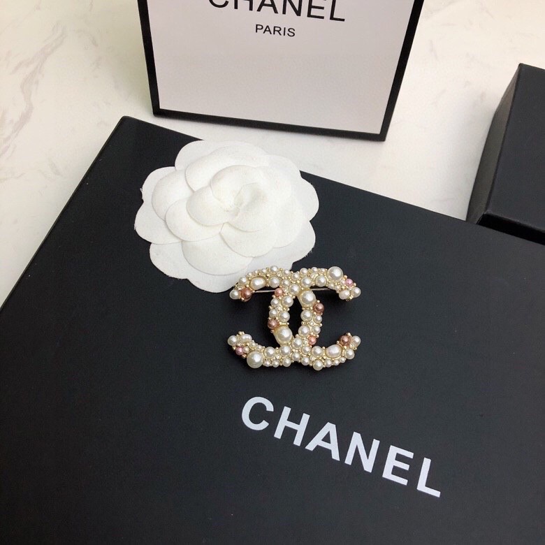 Ch*el brooches